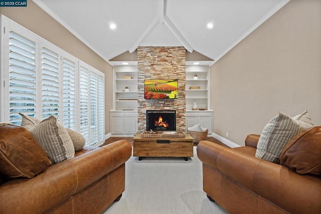 living room with a fireplace, built in shelves, and vaulted ceiling