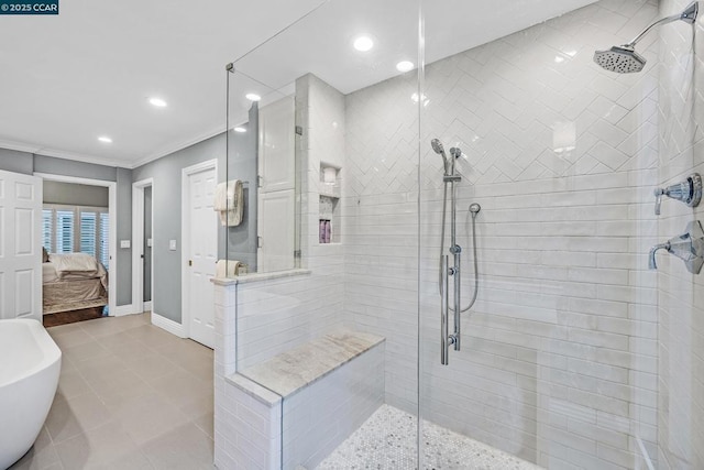 bathroom with tile patterned flooring, crown molding, and independent shower and bath