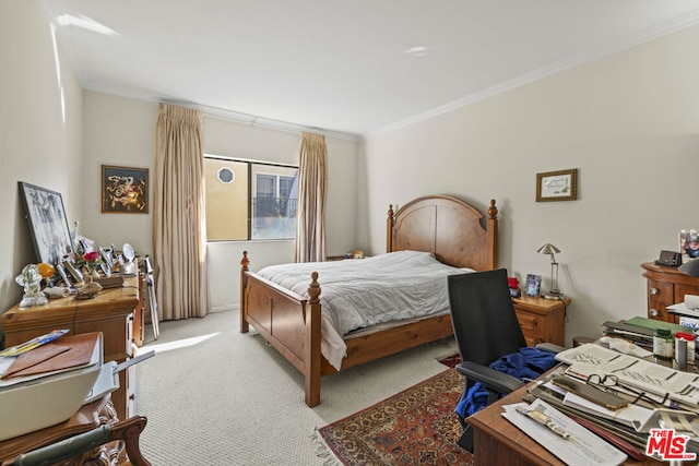 bedroom featuring light carpet and crown molding