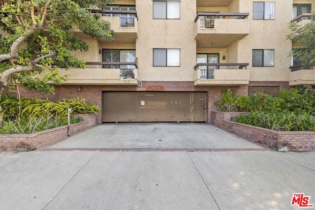 view of property featuring a garage