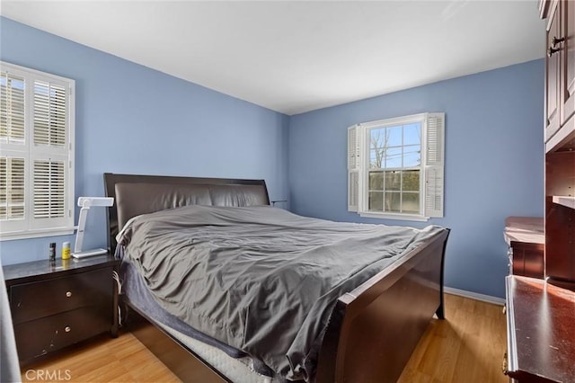 bedroom featuring light hardwood / wood-style floors