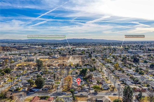 drone / aerial view featuring a mountain view