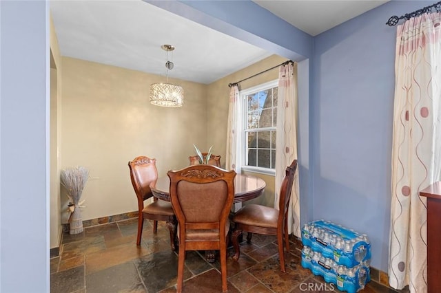 dining room with a chandelier