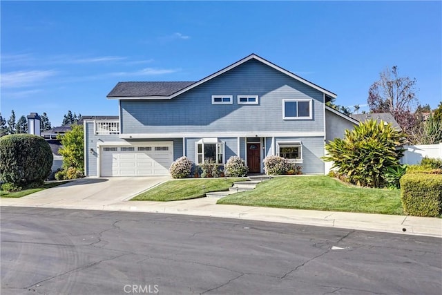 front facade with a garage and a front lawn