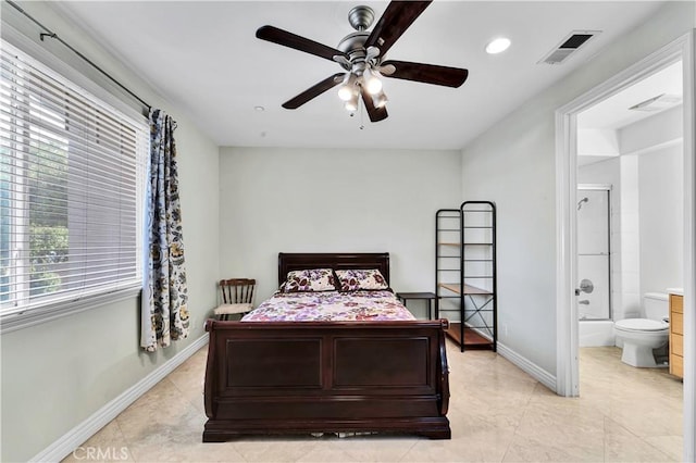 bedroom with ceiling fan and ensuite bathroom