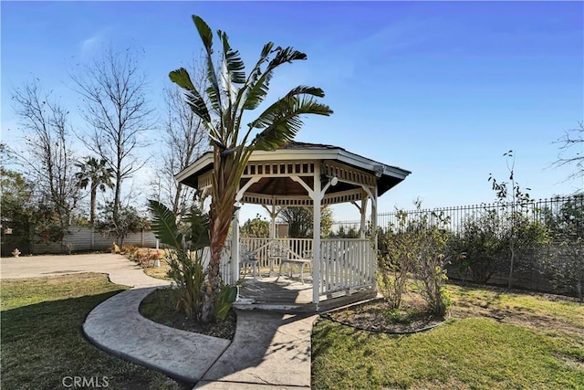 exterior space featuring a gazebo and a lawn