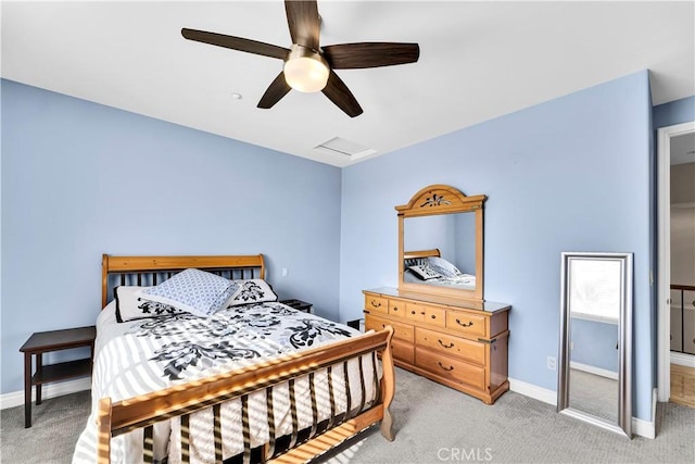 bedroom with light carpet and ceiling fan