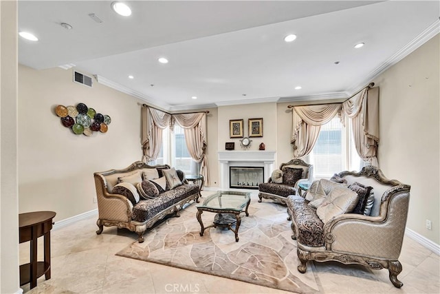 living room with light tile patterned floors, ornamental molding, and a healthy amount of sunlight