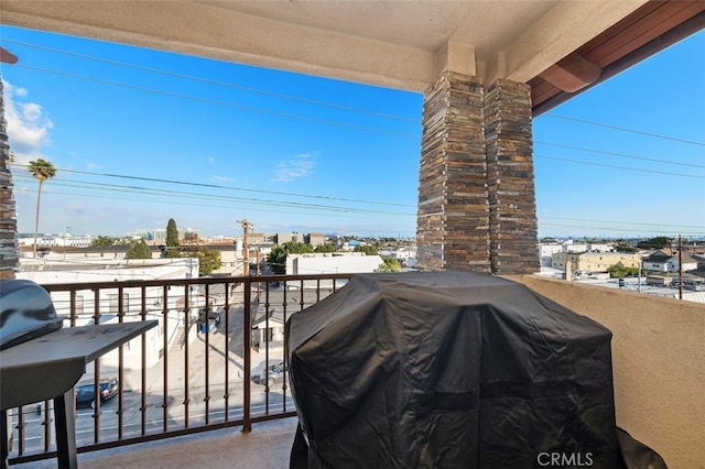 balcony featuring area for grilling