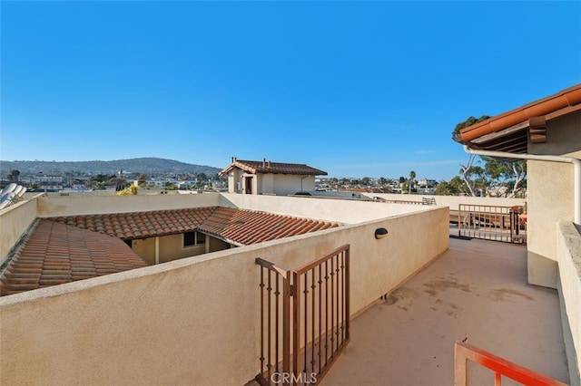 view of patio / terrace featuring a mountain view