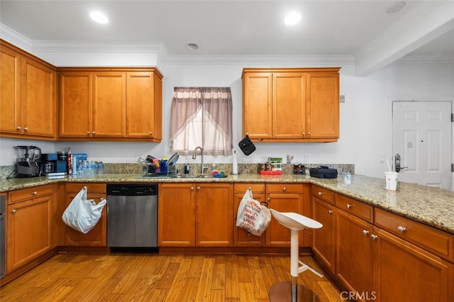 kitchen with sink, crown molding, dishwasher, light stone countertops, and light wood-type flooring