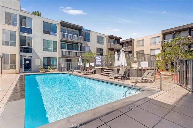 view of pool featuring a patio