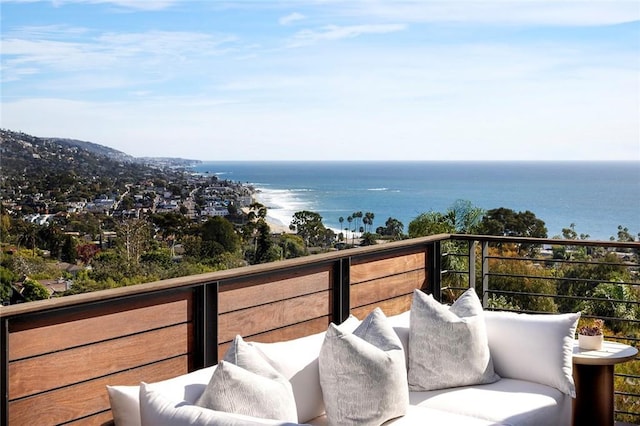 balcony featuring a water view