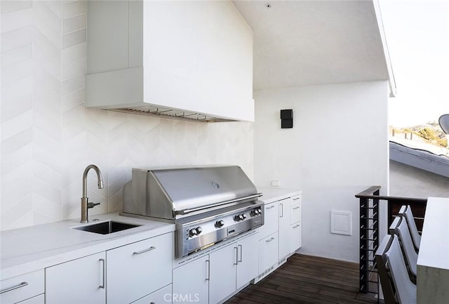 view of patio / terrace featuring sink, a grill, and an outdoor kitchen