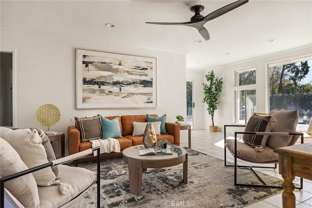 living area featuring ceiling fan and light tile patterned floors