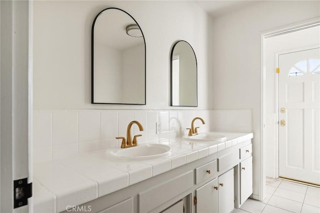 bathroom featuring vanity and tile patterned flooring