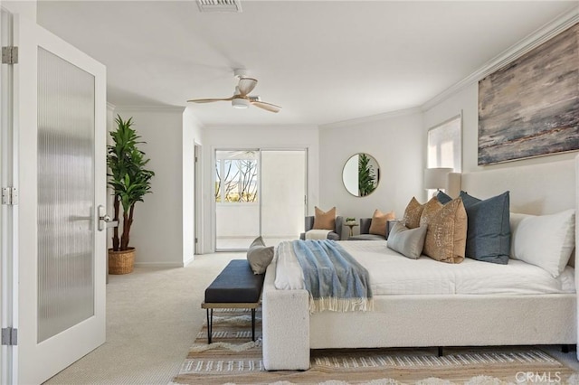 bedroom featuring multiple windows, ornamental molding, light colored carpet, and ceiling fan