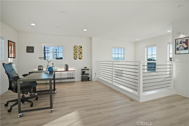 office area featuring light hardwood / wood-style flooring