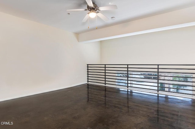 empty room featuring ceiling fan