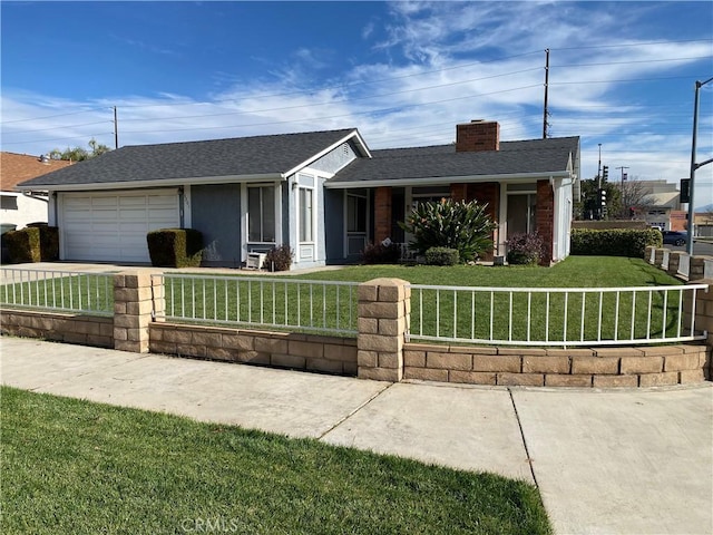 single story home featuring a garage and a front lawn