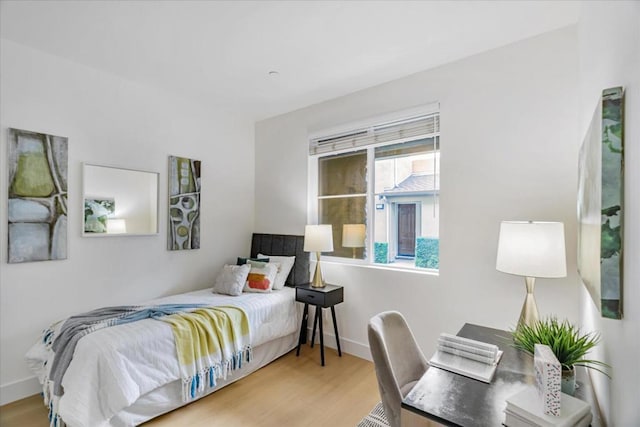 bedroom featuring light wood-type flooring