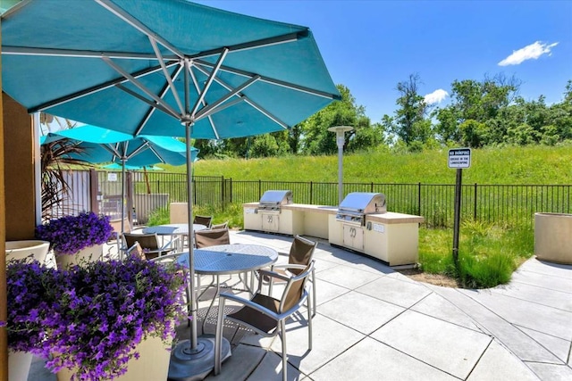 view of patio with grilling area and exterior kitchen