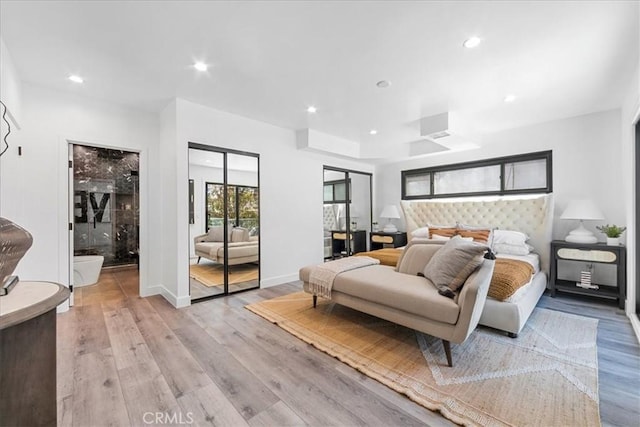 bedroom featuring light wood-type flooring