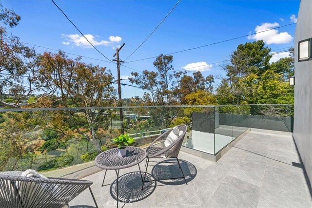 balcony with a patio area