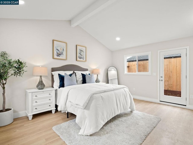 bedroom with vaulted ceiling with beams and light hardwood / wood-style floors