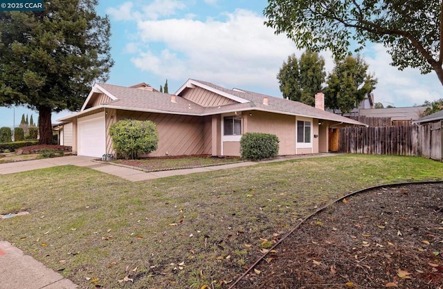 single story home with a garage and a front yard