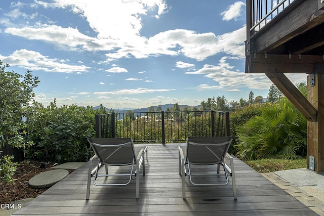 wooden terrace with a mountain view