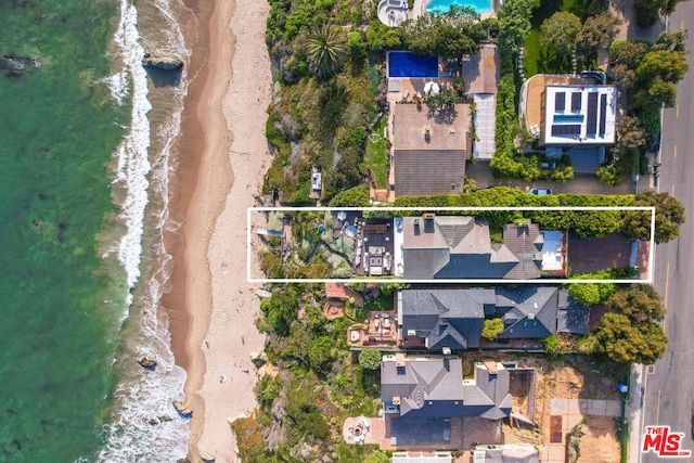 aerial view featuring a beach view and a water view