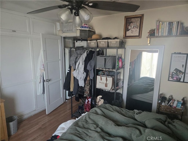 bedroom featuring ceiling fan and hardwood / wood-style floors