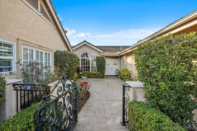 doorway to property featuring a patio