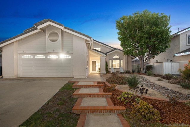 view of front of property featuring a garage