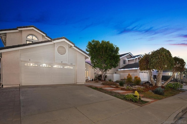 view of front of property with a garage