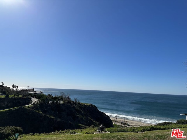 property view of water featuring a view of the beach