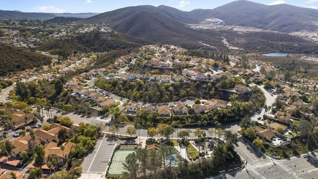 birds eye view of property featuring a mountain view