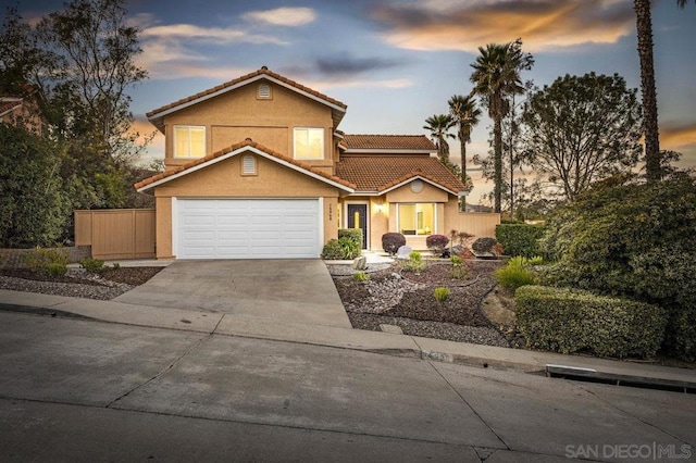 view of front of property featuring a garage