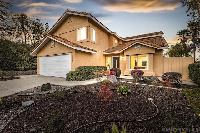 view of front of property with a garage