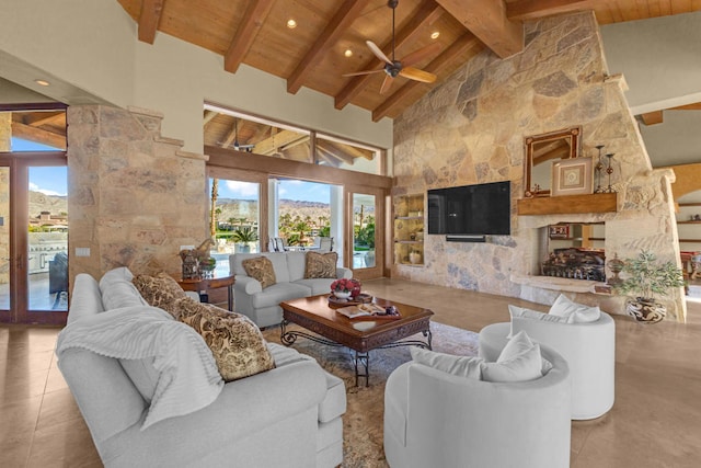 living room with beamed ceiling, wood ceiling, and high vaulted ceiling