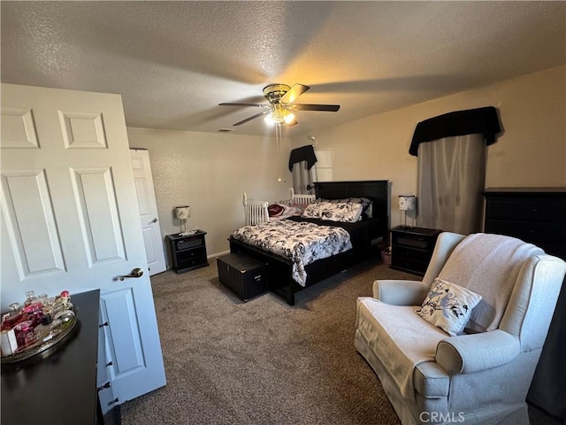 carpeted bedroom with ceiling fan and a textured ceiling