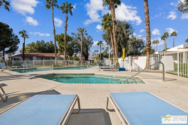 view of pool featuring a patio area