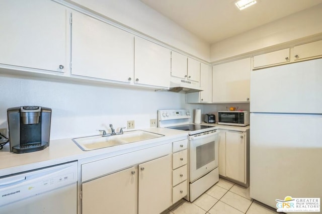 kitchen featuring white cabinetry, sink, white appliances, and light tile patterned floors