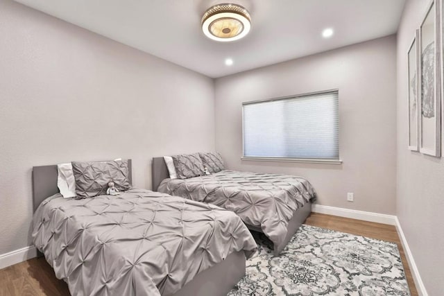 bedroom featuring hardwood / wood-style floors