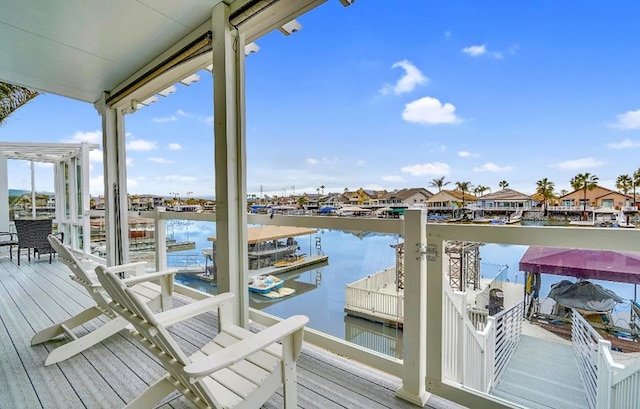 dock area with a water view