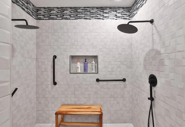 bathroom featuring a tile shower