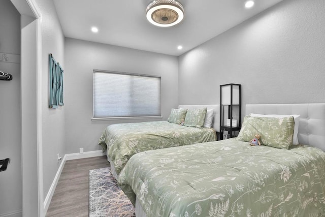 bedroom featuring hardwood / wood-style floors