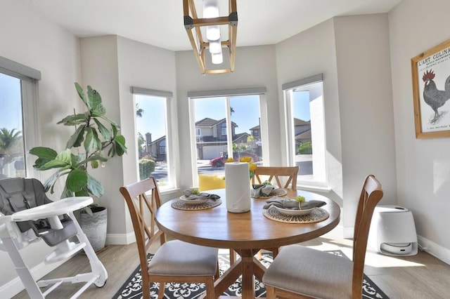 dining room featuring hardwood / wood-style flooring