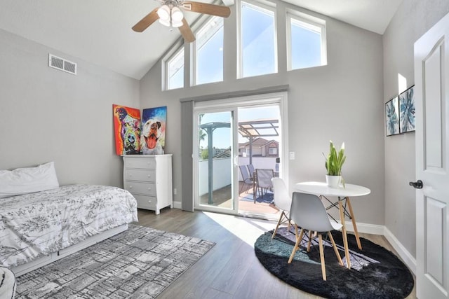 bedroom featuring ceiling fan, high vaulted ceiling, access to exterior, and hardwood / wood-style floors